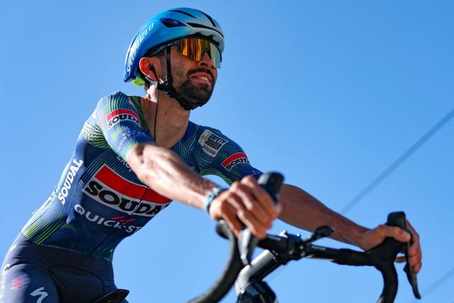 Soudal Quick-Step's French rider Valentin Paret Peintre awaits the start of the 2nd stage of the Tour Auvergne-Rhone-Alpes cycling race (formerly known as the Criterium du Dauphine), 134,3km between Saint-Martin-Le-Vinoux and Le Puy-en-Velay, in the French Alps, on June 8, 2026. (Photo by Anne-Christine POUJOULAT / AFP)