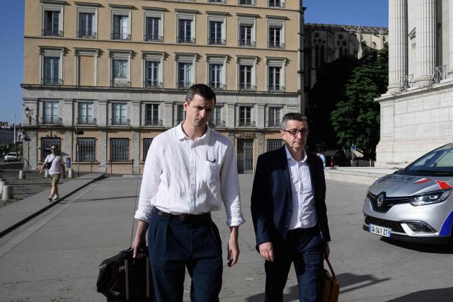 Former mayor of Saint-Etienne Gael Perdriau (R) arrives to attend his appeal trial in the sextape blackmail case at the Lyon Court of Appeal on June 8, 2026. The former mayor of Saint-Etienne, Gaël Perdriau, is retried on appeal starting June 8, 2026, six months after being found "fully guilty" and sentenced to a prison term for blackmail involving a sextape of his first deputy. (Photo by JEFF PACHOUD / AFP)