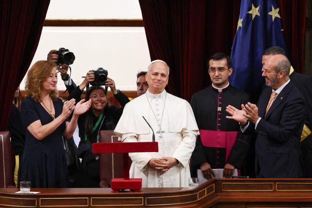 Pope Leo XIV is applauded after delivering a speech during a joint session of the Spanish Parliament at the Congress of Deputies in Madrid on June 8, 2026. Pope Leo XIV is visiting Spain June 6-12 with stops in Madrid, Barcelona, and the Canary Islands, where he will meet with migrants and organisations dedicated to helping them. (Photo by Yara Nardi / POOL / AFP)