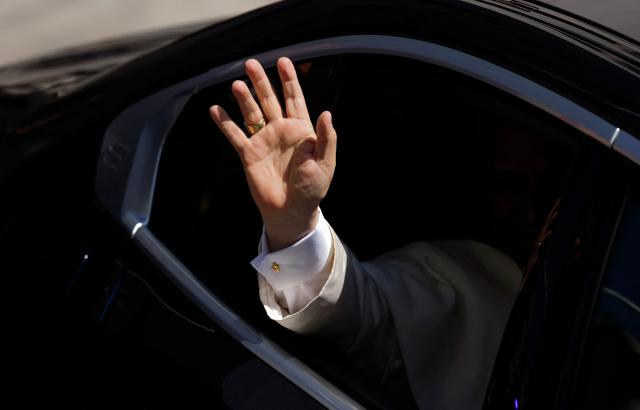 Pope Leo XIV waves as he leaves the Congress of Deputies after delivering a speech to a joint session of the Spanish Parliament in Madrid on June 8, 2026. Pope Leo XIV is visiting Spain June 6-12 with stops in Madrid, Barcelona, and the Canary Islands, where he will meet with migrants and organisations dedicated to helping them. (Photo by Oscar DEL POZO / AFP)