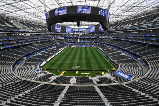 TOPSHOT - The fully installed grass pitch is seen at Los Angeles Stadium (temporarily renamed from SoFi Stadium) ahead of the 2026 FIFA World Cup in Los Angeles on June 7, 2026. (Photo by Patrick T. Fallon / AFP)