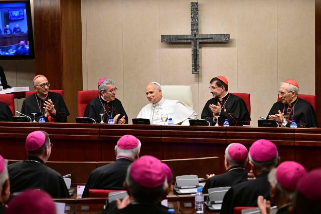 Pope Leo XIV is appplauded after addressing the bishops of Spain at the office of the Episcopal conference in Madrid on June 8, 2026. Pope Leo XIV is visiting Spain June 6-12 with stops in Madrid, Barcelona, and the Canary Islands, where he will meet with migrants and organisations dedicated to helping them. (Photo by Stefano RELLANDINI / AFP)