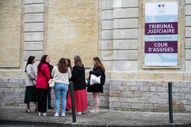 Civil party witnesses wait outside the Saint-Omer Judicial Court, including the complainant, Jennifer C. (2nd L), before the trial of Jerome P. charged with rape and violence in a context of coercive control and polygamy at the Saint-Omer Judicial Court, in Saint-Omer, northern France, on June 8, 2026. The trial of a man accused of ruling his home with terror for two decades, where he lived with three women and their children, opened on June 8, 2026, in the Pas-de-Calais. The defendant denies any violence but acknowledges a “bizarre” family dynamic. (Photo by Sameer Al-DOUMY / AFP)