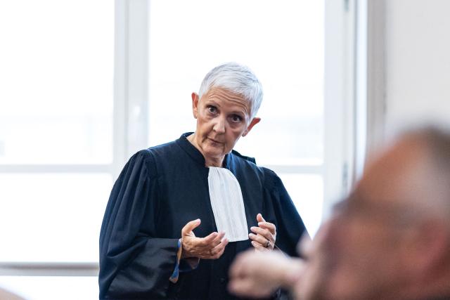 Fabienne Roy-Nansion (L), lawyer for the civil party speaks to civil party witnesses before the trial of Jerome P. charged with rape and violence in a context of coercive control and polygamy at the Saint-Omer Judicial Court, in Saint-Omer, northern France, on June 8, 2026. The trial of a man accused of ruling his home with terror for two decades, where he lived with three women and their children, opened on June 8, 2026, in the Pas-de-Calais. The defendant denies any violence but acknowledges a “bizarre” family dynamic. (Photo by Sameer Al-DOUMY / AFP)