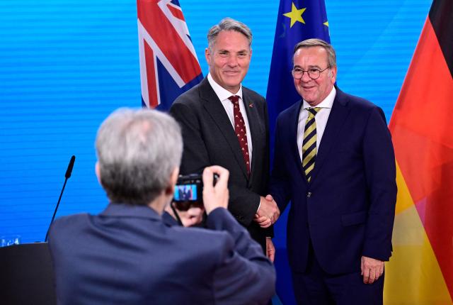 Australian Deputy Prime Minister and Defence Minister Richard Marles (L) and German Defence Minister Boris Pistorius are photographed as they shake hands at the end of a press conference at the Foreign Ministry in Berlin on June 8, 2026. (Photo by John MACDOUGALL / AFP)