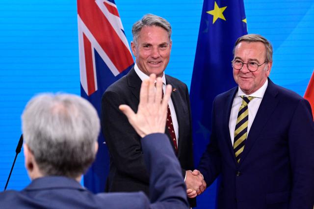 Australian Deputy Prime Minister and Defence Minister Richard Marles (L) and German Defence Minister Boris Pistorius shake hands at the end of a press conference at the Foreign Ministry in Berlin on June 8, 2026. (Photo by John MACDOUGALL / AFP)