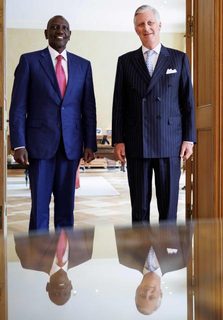 King Philippe - Filip of Belgium (R) welcomes Kenya's President William Ruto ahead of a royal audience, at the Royal Palace, in Brussels, on June 8 2026. (Photo by BENOIT DOPPAGNE / Belga / AFP) / Belgium OUT