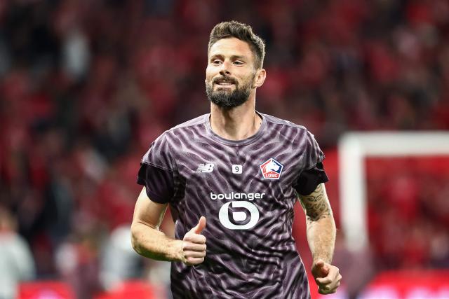 (FILES) Lille's French forward #09 Olivier Giroud looks on ahead of the French L1 football match between Lille LOSC and Le Havre AC at the Pierre Mauroy stadium in Villeneuve-d'Ascq, northern France, on May 3, 2026. Olivier Giroud, the all-time leading goalscorer for Les Bleus, aged 39, has extended his contract with Lille by one year, the northern club announced on June 8, 2026. Having enjoyed a rather successful return to France last summer (11 goals in 44 matches across all competitions), the centre-forward has decided to postpone his retirement ahead of a season in which Lille will compete in the Champions League. (Photo by Sameer Al-DOUMY / AFP)