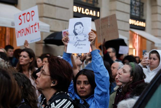 People gather for an unauthorised demonstration at Place Vendome outside the French Justice Ministry in Paris on June 8, 2026, at the call of the Mouv'Enfants collective and other organisations, to demand a law against violence on minors, following the death of Lyhanna, an 11-year-old girl found dead on June 4 after being reported missing on May 29 in southwestern France, on June 8, 2026. (Photo by GEOFFROY VAN DER HASSELT / AFP)