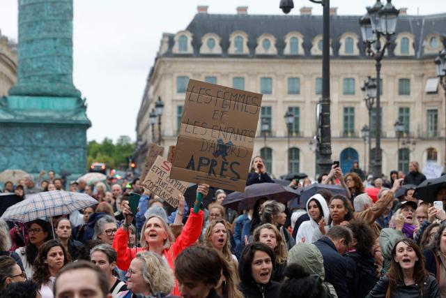 People gather at Palce Vendome outside the French Justice Ministry in Paris on June 8, 2026, at the call of the Mouv'Enfants collective and other organisations, to demand a law against violence on minors, following the death of Lyhanna, an 11-year-old girl found dead on June 4 after being reported missing on May 29 in southwestern France, on June 8, 2026. (Photo by GEOFFROY VAN DER HASSELT / AFP)