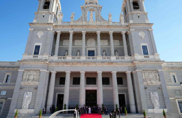 Pope Leo XIV (C) leaves the Almudena Cathedral after leading prayer and devotion to Our Lady of Almudena in Madrid on June 8, 2026. Pope Leo XIV is visiting Spain June 6-12 with stops in Madrid, Barcelona, and the Canary Islands, where he will meet with migrants and organisations dedicated to helping them. (Photo by Cesar MANSO / AFP)