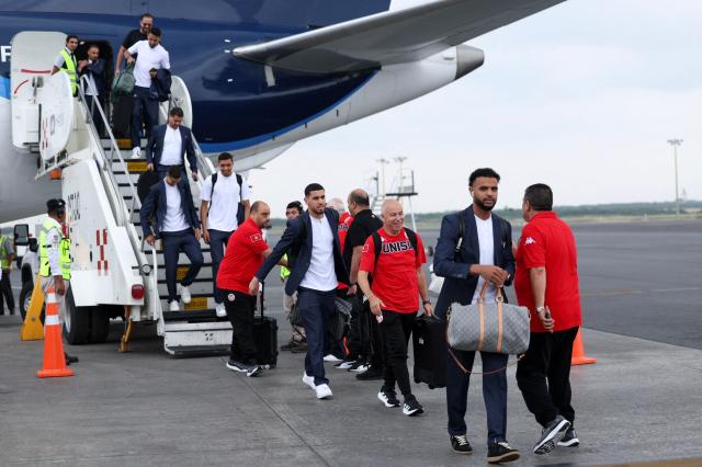 Tunisia's players and staff arrive at Monterrey International Airport in Monterrey, Mexico, on June 8, 2026, ahead of the FIFA 2026 World Cup football tournament. (Photo by Julio Cesar AGUILAR / AFP)