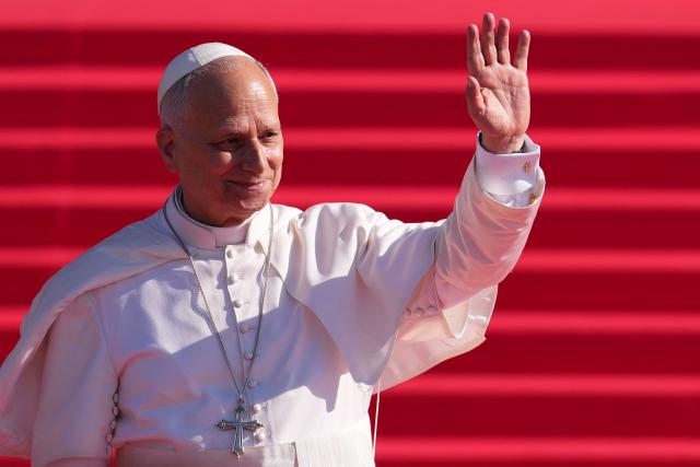 Pope Leo XIV waves as he leaves the Almudena Cathedral after leading prayer and devotion to Our Lady of Almudena in Madrid on June 8, 2026. Pope Leo XIV is visiting Spain June 6-12 with stops in Madrid, Barcelona, and the Canary Islands, where he will meet with migrants and organisations dedicated to helping them. (Photo by Cesar MANSO / AFP)