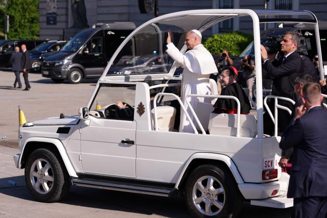 Pope Leo XIV waves as he leaves the Almudena Cathedral after leading prayer and devotion to Our Lady of Almudena in Madrid on June 8, 2026. Pope Leo XIV is visiting Spain June 6-12 with stops in Madrid, Barcelona, and the Canary Islands, where he will meet with migrants and organisations dedicated to helping them. (Photo by Cesar MANSO / AFP)