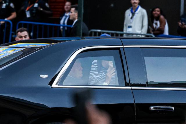 US President Donald Trump waves to fans as he arrives at Madison Square Garden ahead of NBA Finals game 3 between the New York Knicks and the San Antonio Spurs in New York, on June 8, 2026. (Photo by CHARLY TRIBALLEAU / AFP)