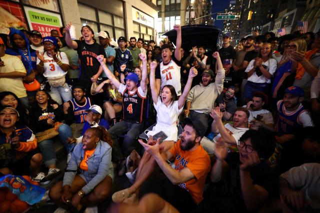 New York Knicks fans watch game three of the NBA Finals between the San Antonio Spurs and the New York Knicks near Bryant Park, in New York, on June 8, 2026. (Photo by CHARLY TRIBALLEAU / AFP)