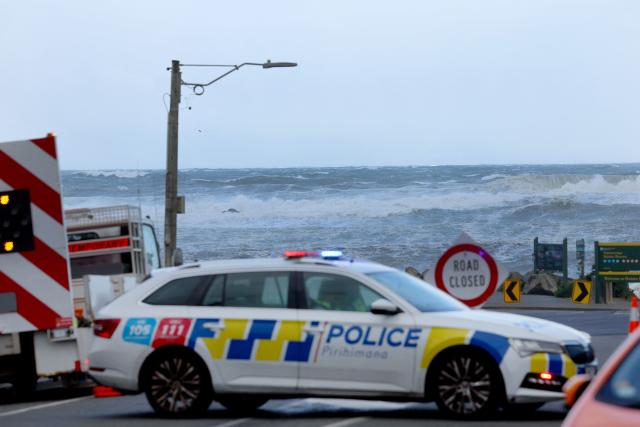 Stormy seas pound the coastline in the Wellington suburb of Owhiro Bay on June 9, 2026. Hundreds of people were forced to evacuate their seaside homes on June 9 in New Zealand's capital as 11-metre high waves lashed the city's south coast. (Photo by Ben STRANG / AFP)