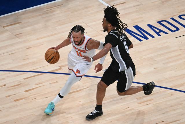 Knicks guard #11 Jalen Brunson and San Antonio Spurs' #05 Stephon Castle vie for the ball during Game Three of the NBA Finals between the San Antonio Spurs and the New York Knicks at Madison Square Garden in New York on June 8, 2026. (Photo by SAUL LOEB / AFP)
