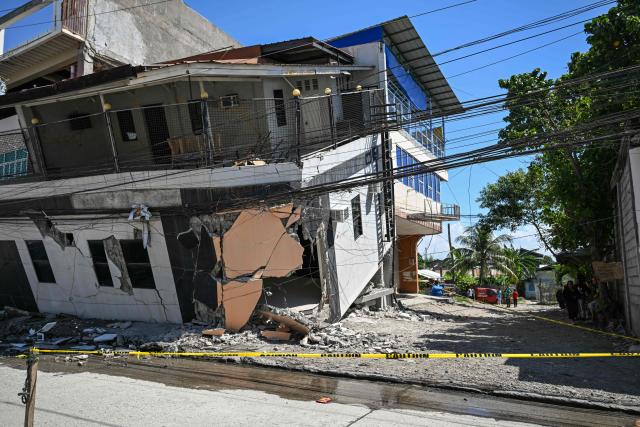 This photo shows a collapsed building after a 7.8 magnitude earthquake in General Santos City on June 9, 2026. A 7.8-magnitude earthquake in the southern Philippines on June 8 killed at least 35 people, according to provincial authorities, after toppling buildings and sparking tsunami warnings across the region. (Photo by Jam STA ROSA / AFP)