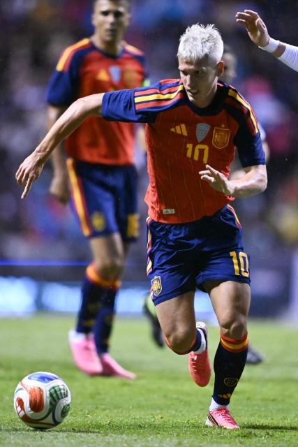 Spain's forward #10 Dani Olmo controls the ball during the international friendly football match between Peru and Spain at Cuauhtemoc Stadium in Puebla, Mexico, on June 8, 2026. (Photo by CARL DE SOUZA / AFP)
