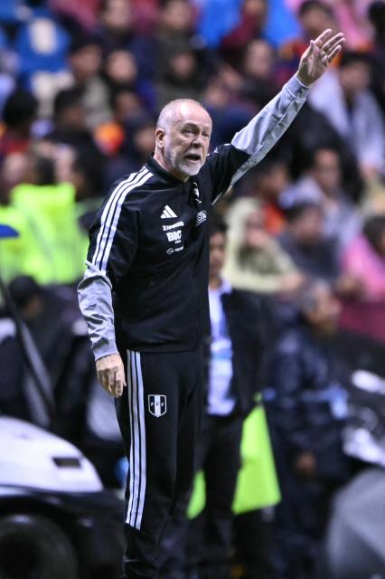 Peru's Brazilian head coach Mano Menezes is seen during the international friendly football match between Peru and Spain at Cuauhtemoc Stadium in Puebla, Mexico, on June 8, 2026. (Photo by CARL DE SOUZA / AFP)