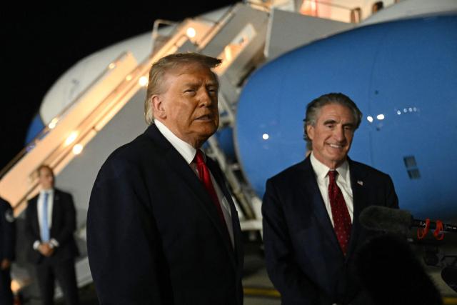 US President Donald Trump speaks to the press before boarding Air Force One prior to departure from John F. Kennedy International Airport, in New York, on June 8, 2026. Trump is returning to the White House after attending Game Three of the NBA Finals. (Photo by SAUL LOEB / AFP)