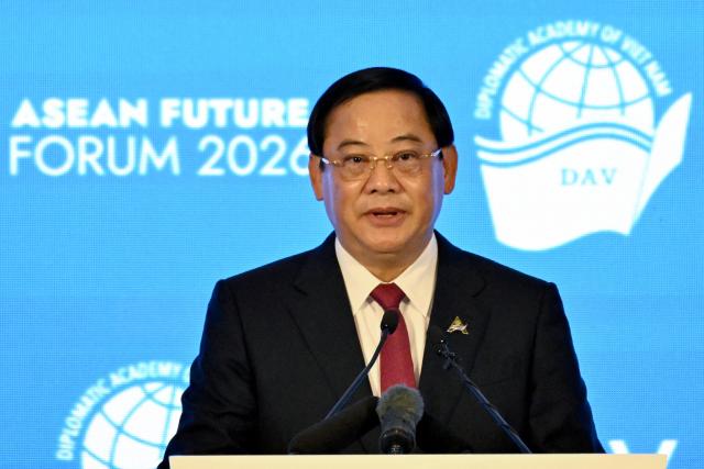 Laos' Prime Minister Sonexay Siphandone delivers a speech during the ASEAN Future Forum 2026 at the Melia Hotel in Hanoi on June 9, 2026. (Photo by Nhac NGUYEN / AFP)