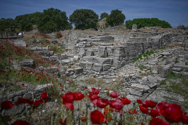 This photograph shows a view of the ruins of the ancient city of Troy in Çanakkale on June 2, 2026. A gift from the film set of "Troy", the giant Trojan Horse replica looms over the port of Canakkale on the Dardanelles Strait in western Turkey. First related by Homer, then retold for the silver screen in 2004, with Brad Pitt as Achilles, the legend of the ancient city travels to Rome's Colosseum this week, where a major new exhibition opens on June 12, 2026. (Photo by Ozan KOSE / AFP)