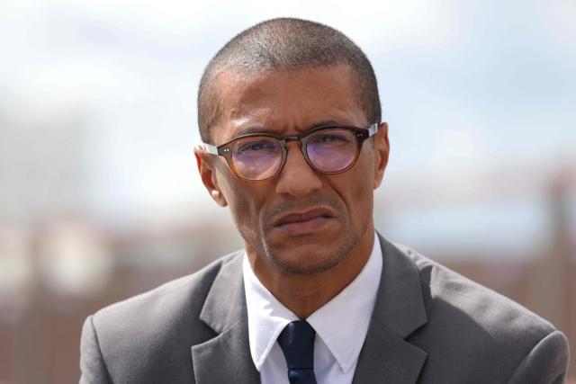 (FILES) Mayor of Saint-Ouen Karim Bouamrane attends the official inauguration of the "Franchissement Urbain Pleyel" pedestrian footbridge connecting the Paris 2024 Olympic and Paralympic athletes' village to Olympic event venues, in Saint-Denis, north of Paris, on May 16, 2024. The mayor of Saint-Ouen, Karim Bouamrane (Socialist Party), announced on June 9, 2026 that he would stand in the 2027 presidential election as a candidate “capable of uniting” the non-Melenchonist left, describing himself as “grounded in reality”. (Photo by Thomas SAMSON / AFP)