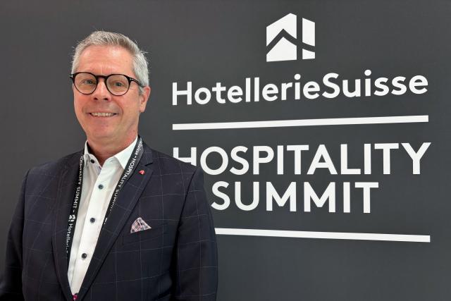 Head of the industry association HotellerieSuisse, Martin von Moos poses during the Hospitality Summit in Bern, on June 3, 2026. Swiss business leaders and unions are mobilising ahead of a vote on June 14, 2026 on capping immigration, which has triggered fears of dire impacts on employment and trade relations with the European Union. The vote will focus on a proposal by the hard-right Swiss People's Party (SVP) aimed at keeping the wealthy Alpine nation's population -- currently 9.1 million -- below 10 million until 2050. (Photo by Nathalie OLOF-ORS / AFP)