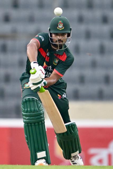 Bangladesh's Najmul Hossain Shanto plays a shot during the first one-day international (ODI) cricket match between Bangladesh and Australia at the Sher-e-Bangla National Cricket Stadium in Dhaka on June 9, 2026. (Photo by MUNIR UZ ZAMAN / AFP)