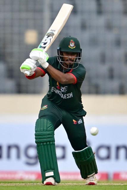 Bangladesh's Tanzid Hasan plays a shot during the first one-day international (ODI) cricket match between Bangladesh and Australia at the Sher-e-Bangla National Cricket Stadium in Dhaka on June 9, 2026. (Photo by MUNIR UZ ZAMAN / AFP)