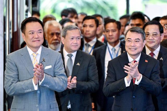 Thailand's Prime Minister Anutin Charnvirakul (L), Cambodia's Prime Minister Hun Manet (2nd L) and Vietnam's Prime Minister Le Minh Hung (R) arrive to attend the ASEAN Future Forum 2026 at the Melia Hotel in Hanoi on June 9, 2026. (Photo by Nhac NGUYEN / AFP)