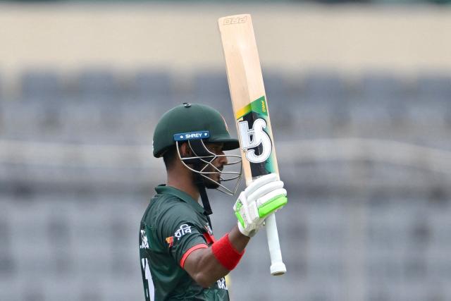 Bangladesh's Tanzid Hasan celebrates after scoring a half-century (50 runs) during the first one-day international (ODI) cricket match between Bangladesh and Australia at the Sher-e-Bangla National Cricket Stadium in Dhaka on June 9, 2026. (Photo by MUNIR UZ ZAMAN / AFP)