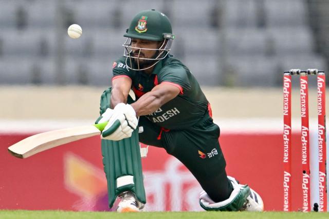 Bangladesh's Najmul Hossain Shanto plays a shot during the first one-day international (ODI) cricket match between Bangladesh and Australia at the Sher-e-Bangla National Cricket Stadium in Dhaka on June 9, 2026. (Photo by MUNIR UZ ZAMAN / AFP)