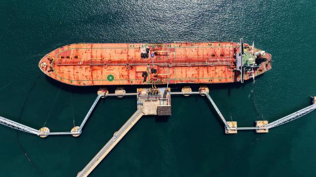 This aerial photo shows a tanker unloading imported crude oil at a terminal port in Qingdao, in China’s eastern Shandong province on June 9, 2026. (Photo by CN-STR / AFP) / China OUT