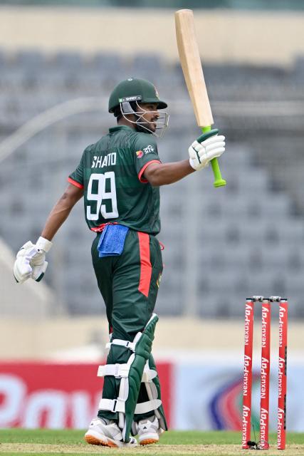 Bangladesh's Najmul Hossain Shanto gestures during the first one-day international (ODI) cricket match between Bangladesh and Australia at the Sher-e-Bangla National Cricket Stadium in Dhaka on June 9, 2026. (Photo by MUNIR UZ ZAMAN / AFP)