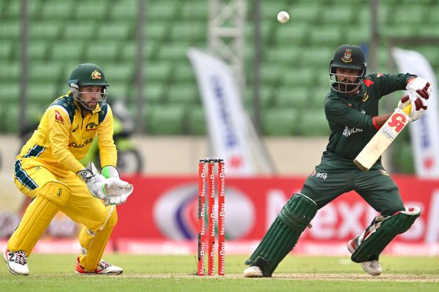 Bangladesh's Tawhid Hridoy plays a shot during the first one-day international (ODI) cricket match between Bangladesh and Australia at the Sher-e-Bangla National Cricket Stadium in Dhaka on June 9, 2026. (Photo by MUNIR UZ ZAMAN / AFP)