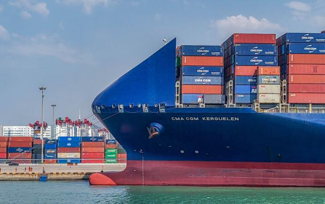 A container ship is seen at berth at the port in Qingdao, in China’s eastern Shandong province on June 9, 2026. (Photo by CN-STR / AFP) / China OUT