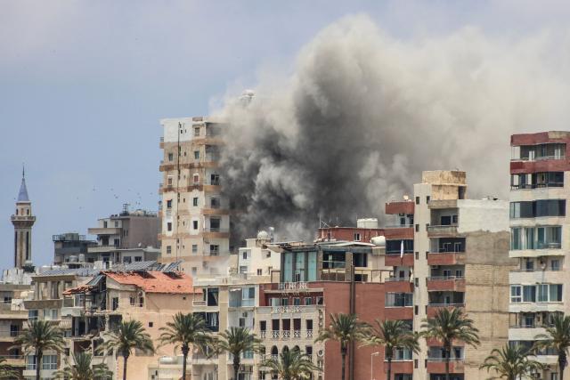 Smoke rises following an Israeli airstrike on the southern city of Tyre on June 9, 2026. Residents of south Lebanon's Tyre including the Christian quarter fled on June 9, an AFP correspondent said, after Israel's army for the first time warned the entire city to evacuate ahead of strikes. The warning came a day after Iran, which insists a halt to the wider Middle East conflict must include a ceasefire in Lebanon, warned it would resume attacks on Israel if it kept striking its neighbour. (Photo by KAWANT HAJU / AFP) / 
