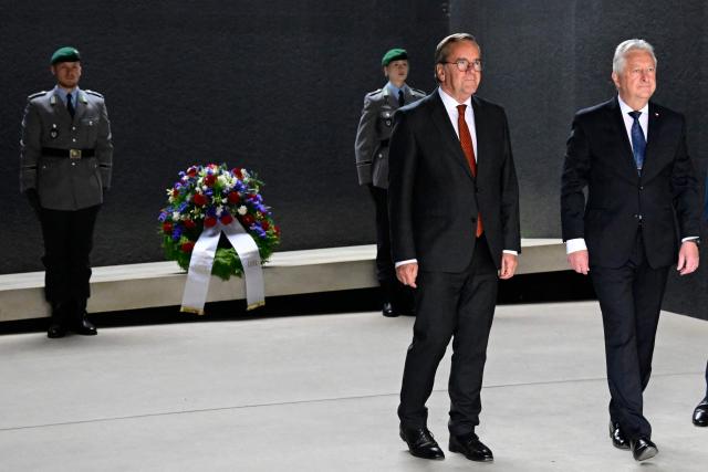 German Defence Minister Boris Pistorius (L) and his Czech counterpart Jaromir Zuna attend a wreath laying ceremony prior to a meeting at the defence ministry in Berlin , on June 9th, 2026. (Photo by Tobias SCHWARZ / AFP)