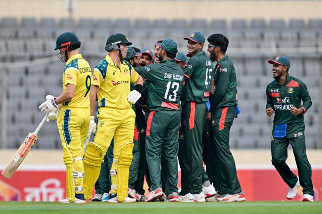Bangladesh’s players celebrate after the dismissal of Australia's Marnus Labuschagne during the first one-day international (ODI) cricket match between Bangladesh and Australia at the Sher-e-Bangla National Cricket Stadium in Dhaka on June 9, 2026. (Photo by Munir UZ ZAMAN / AFP)
