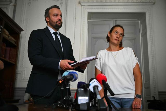 French lawyer Pierre Debuisson and Audrey (a pseudonym), the mother of a child who accused Jerome B of dozens of rapes give a press conference to announce that they are willing to file a complaint against the State and against the Minister of Justice, on June 9, 2026 in Toulouse, southwestern France. Jerome B., the prime suspect in the kidnapping and death of Lyhanna in Fleurance had been the subject of several complaints and reports of rape of minors. Some had been dismissed, but one of them, filed in August 2025, had not been followed up with a sufficiently prompt investigation. And he had neither been questioned nor taken into custody. (Photo by Lionel BONAVENTURE / AFP)