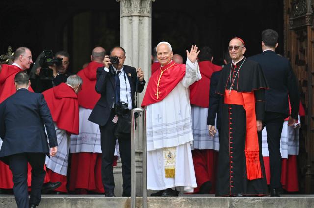 Pope Leo XIV waves as he arrives to the Cathedral of the Holy Cross and Saint Eulalia in Barcelona, on June 9, 2026. Pope Leo XIV is visiting Spain June 6-12 with stops in Madrid, Barcelona, and the Canary Islands, where he will meet with migrants and organisations dedicated to helping them. (Photo by Manu Quintero / AFP)