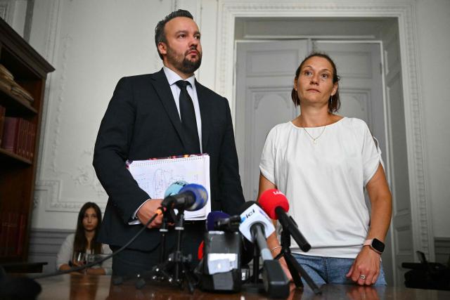 French lawyer Pierre Debuisson and Audrey (a pseudonym), the mother of a child who accused Jerome B of dozens of rapes give a press conference to announce that they are willing to file a complaint against the State and against the Minister of Justice, on June 9, 2026 in Toulouse, southwestern France. Jerome B., the prime suspect in the kidnapping and death of Lyhanna in Fleurance had been the subject of several complaints and reports of rape of minors. Some had been dismissed, but one of them, filed in August 2025, had not been followed up with a sufficiently prompt investigation. And he had neither been questioned nor taken into custody. (Photo by Lionel BONAVENTURE / AFP)