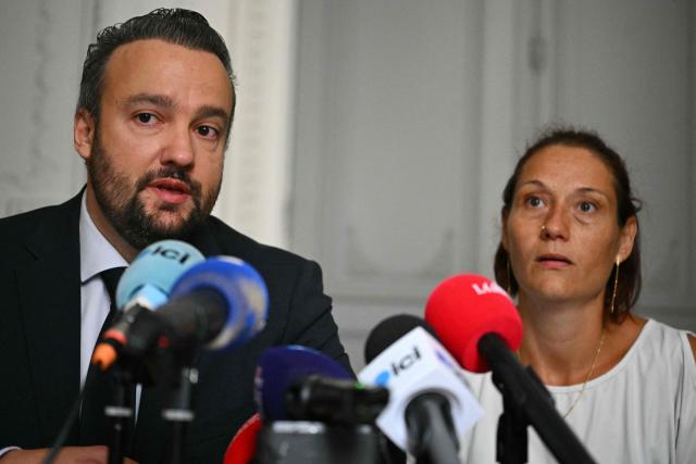 French lawyer Pierre Debuisson and Audrey (a pseudonym), the mother of a child who accused Jerome B of dozens of rapes give a press conference to announce that they are willing to file a complaint against the State and against the Minister of Justice, on June 9, 2026 in Toulouse, southwestern France. Jerome B., the prime suspect in the kidnapping and death of Lyhanna in Fleurance had been the subject of several complaints and reports of rape of minors. Some had been dismissed, but one of them, filed in August 2025, had not been followed up with a sufficiently prompt investigation. And he had neither been questioned nor taken into custody. (Photo by Lionel BONAVENTURE / AFP)