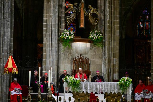 Pope Leo XIV holds a midday prayer in the Cathedral of the Holy Cross and Saint Eulalia in Barcelona, on June 9, 2026. Pope Leo XIV is visiting Spain June 6-12 with stops in Madrid, Barcelona, and the Canary Islands, where he will meet with migrants and organisations dedicated to helping them. (Photo by Stefano RELLANDINI / AFP)