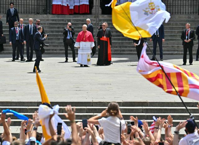 Pope Leo XIV is cheered as he arrives to the Cathedral of the Holy Cross and Saint Eulalia in Barcelona, on June 9, 2026. Pope Leo XIV is visiting Spain June 6-12 with stops in Madrid, Barcelona, and the Canary Islands, where he will meet with migrants and organisations dedicated to helping them. (Photo by Manu Quintero / AFP)
