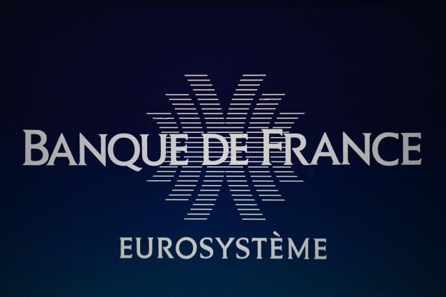 (FILES) This photograph taken on December 6, 2022, shows the logo of the Banque de France at the Banque de France headquarters in Paris. The Banque de France will lower its 2026 growth forecasts, confirmed new governor Emmanuel Moulin on June 9, 2026. (Photo by Christophe ARCHAMBAULT / AFP)