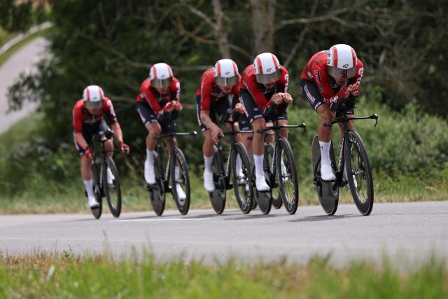 Lotto Intermarche's team riders cycle during the 3rd stage of the Tour Auvergne-Rhone-Alpes cycling race (formerly known as the Criterium du Dauphine), 28,4km team time trial departing and arriving in Perreux near the Massif Central, on June 9, 2026. (Photo by Anne-Christine POUJOULAT / AFP)
